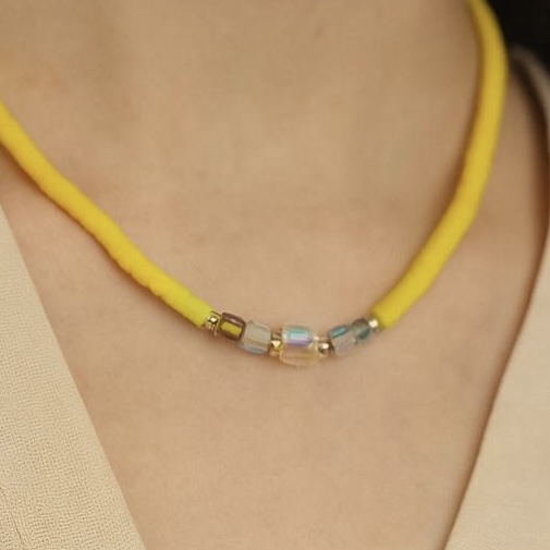 Yellow surfer necklace